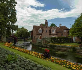 road-surrounded-by-buildings-gardens-after-rain-canterbury-uk (1)
